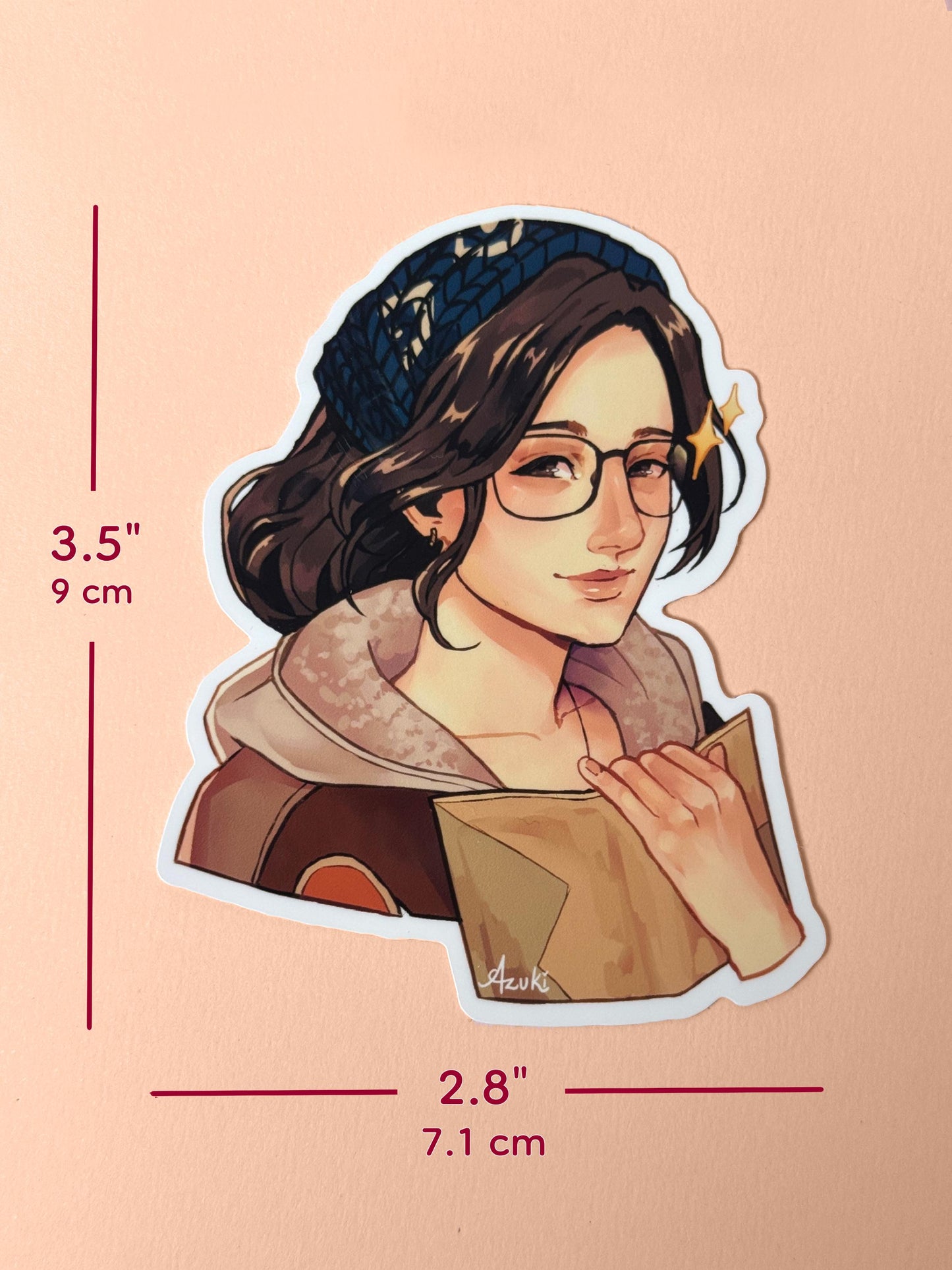 The Alma sticker measures 3.5 inches tall and 2.8 inches wide.