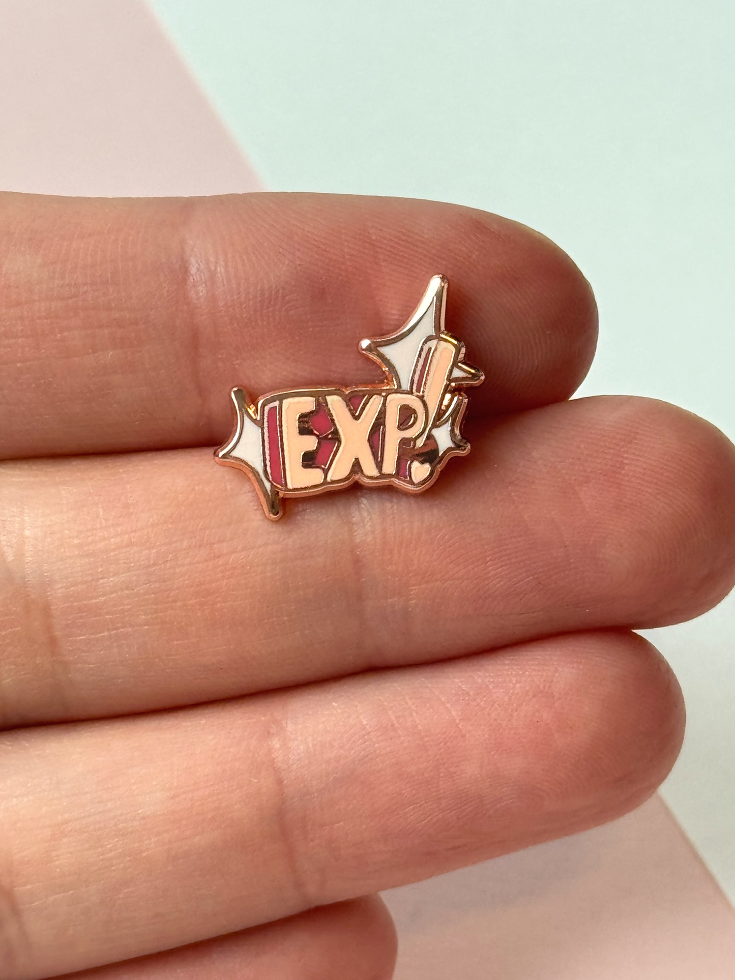 The EXP pin held in hand