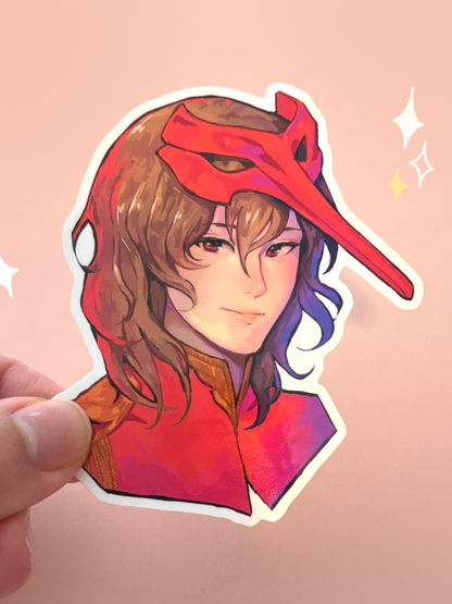 Die-cut vinyl sticker of Goro Akechi from Persona 5, wearing his Phantom Thief mask and red crow outfit, held between fingers against a peach background.