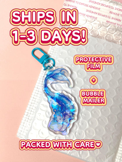 The holographic mermaid keychain ships in 1 to 3 days in a protective film and bubble mailer.
