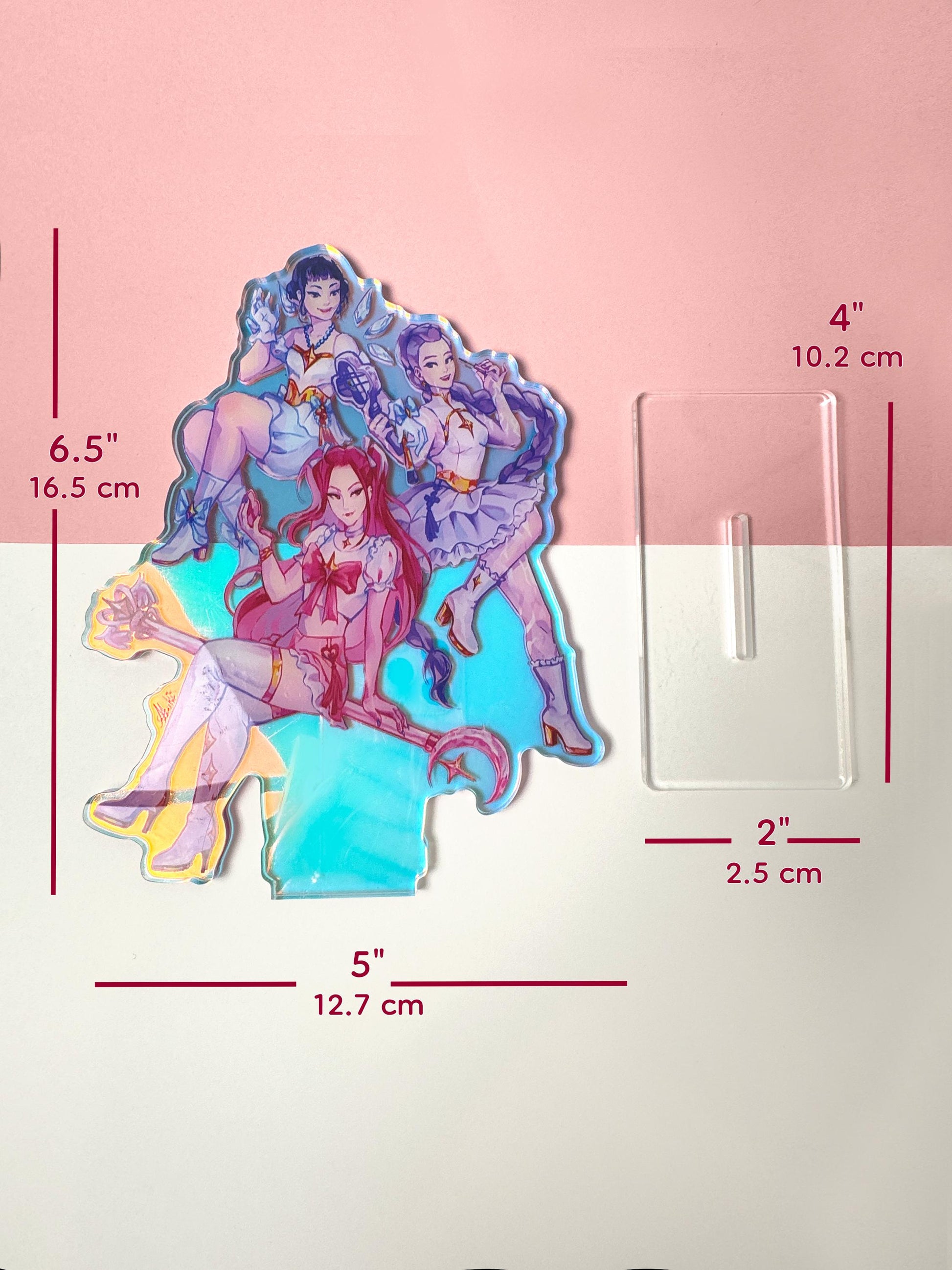The Huntrix standee measures 6.5 inches tall and 5 inches wide. The base is 4 inches wide and 2 inches tall.