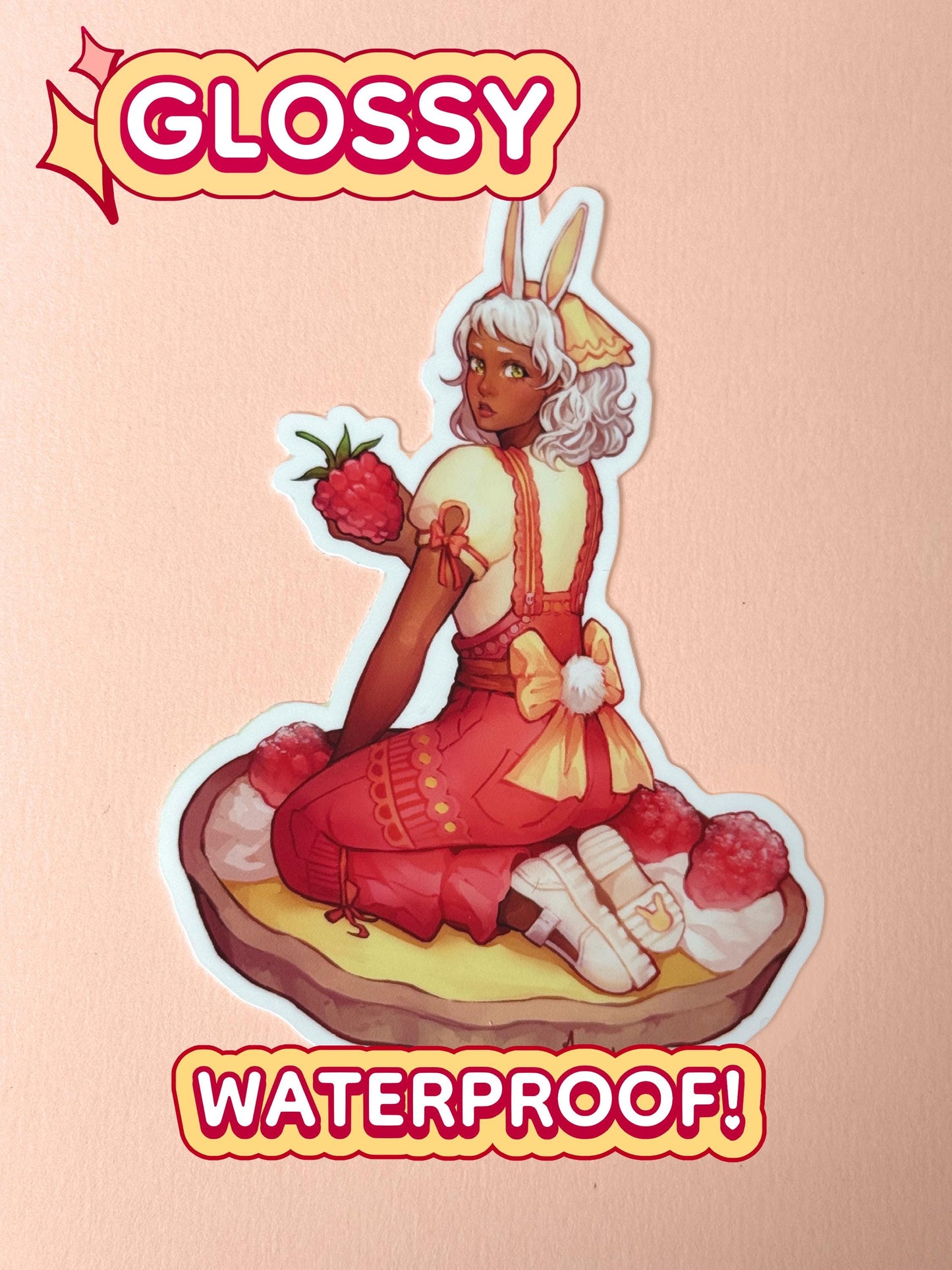 The lemon raspberry tart bunny girl sticker is glossy and waterproof.