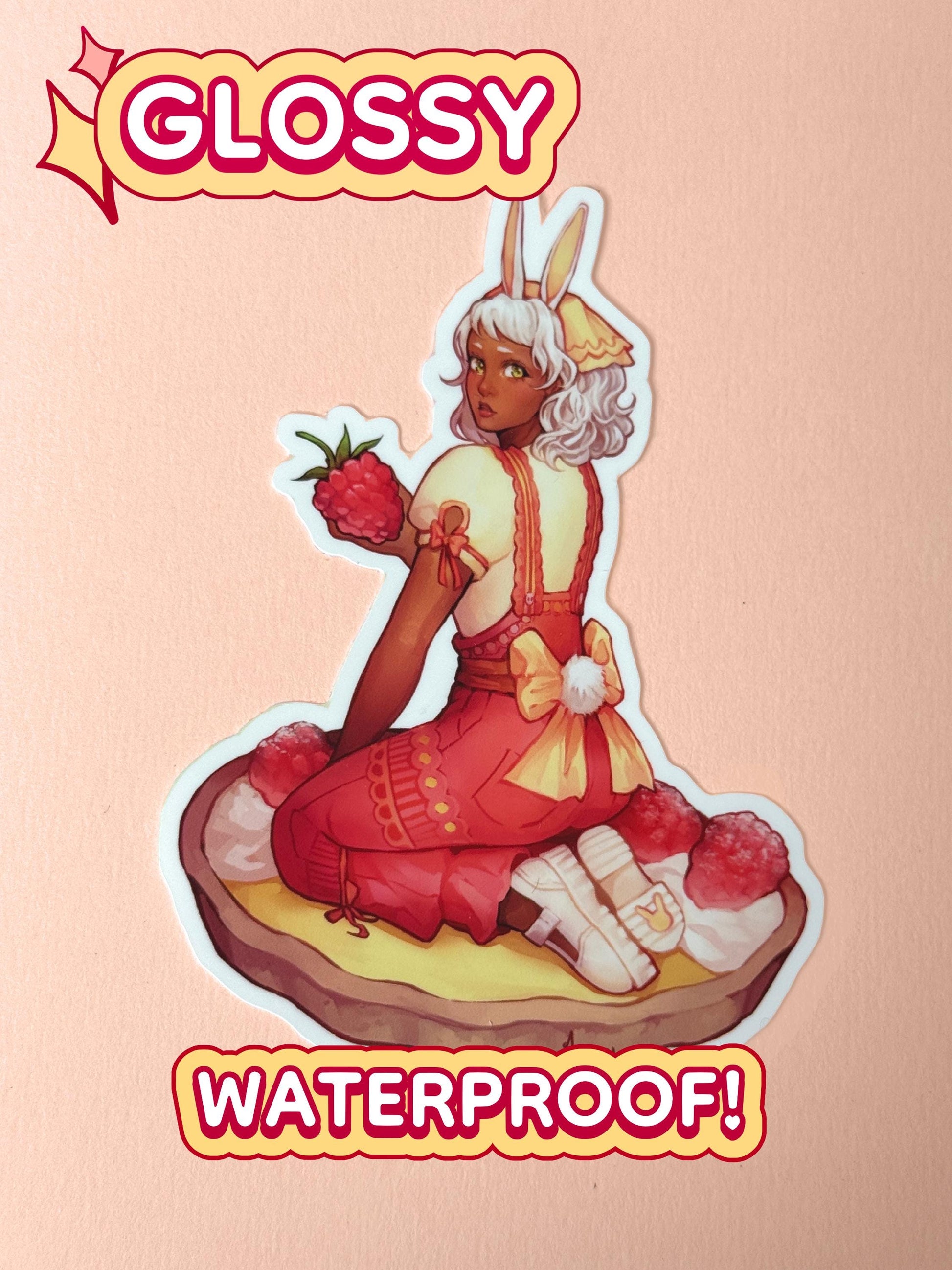 The lemon raspberry tart bunny girl sticker is glossy and waterproof.