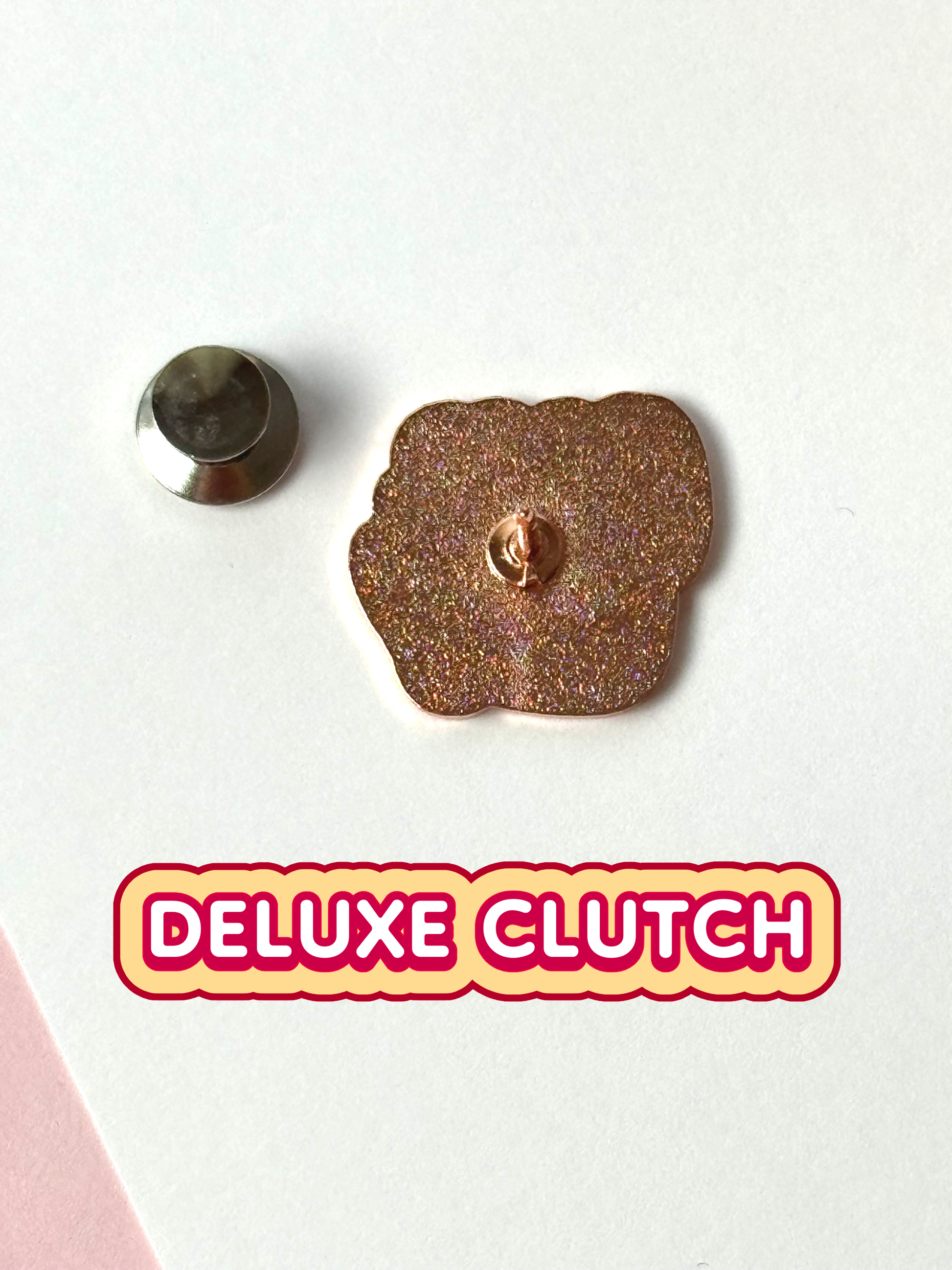 The LVL UP pin's back view with its deluxe clutch.