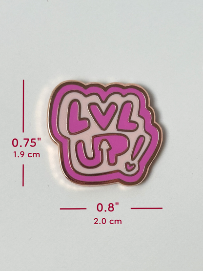 The LVL UP pin measures 0.75 inches tall and 0.8 inches wide.
