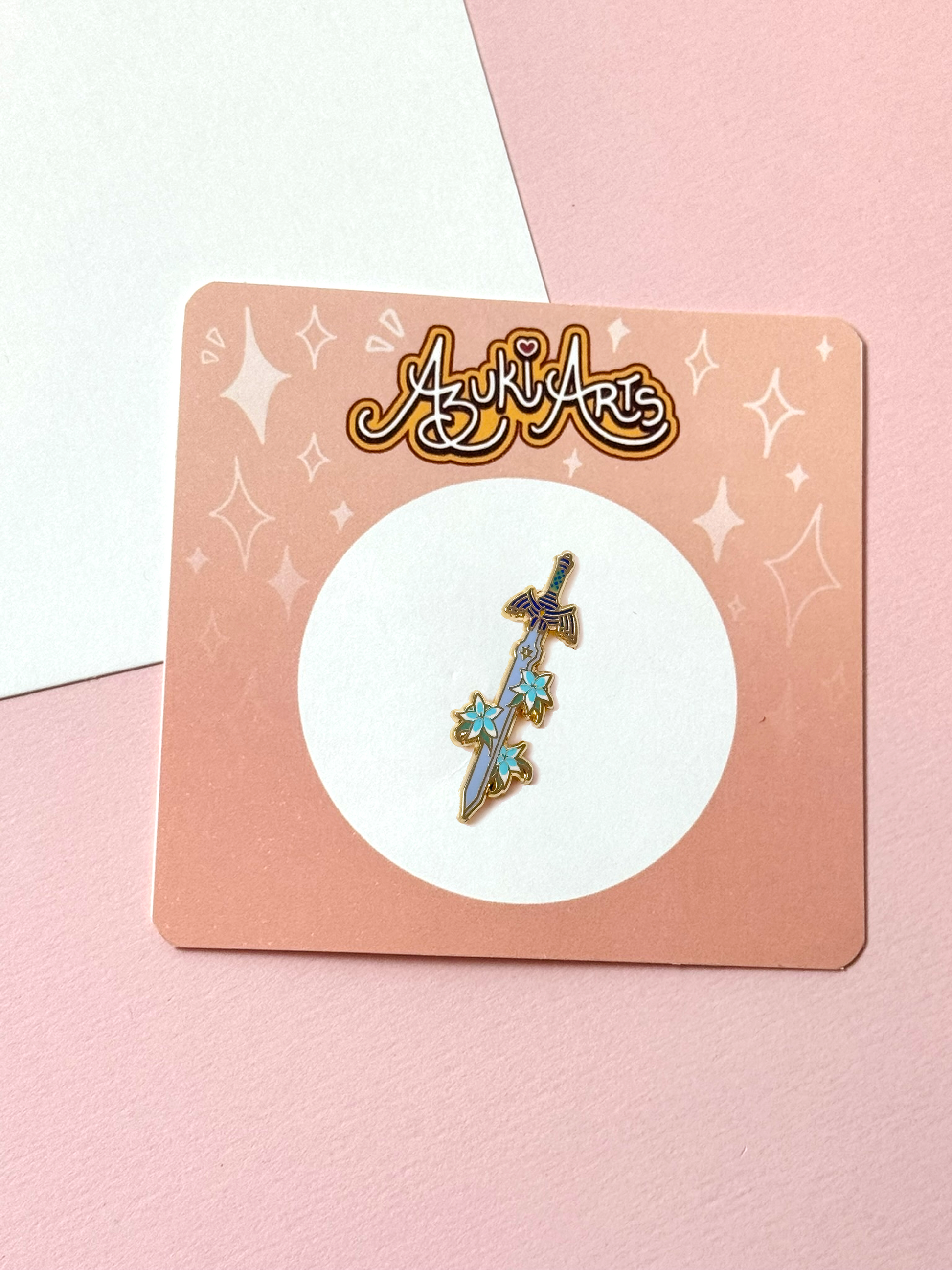 The master sword pin with the backing card.