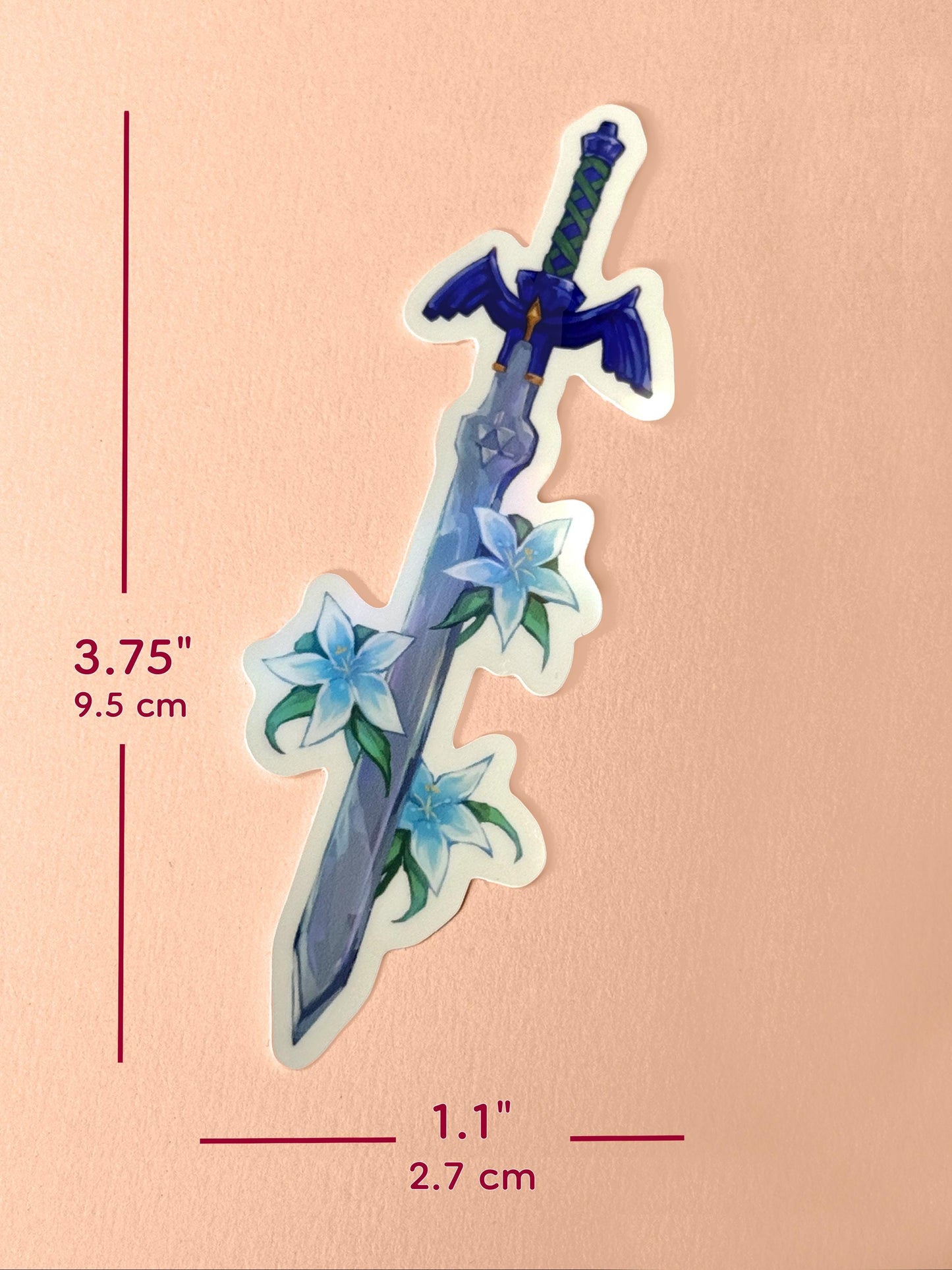 The master sword sticker measures 3.75 inches tall and 1.1 inches wide.