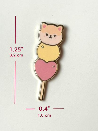 The May mochi pin is 1.25 inches tall and 0.4 inches wide.