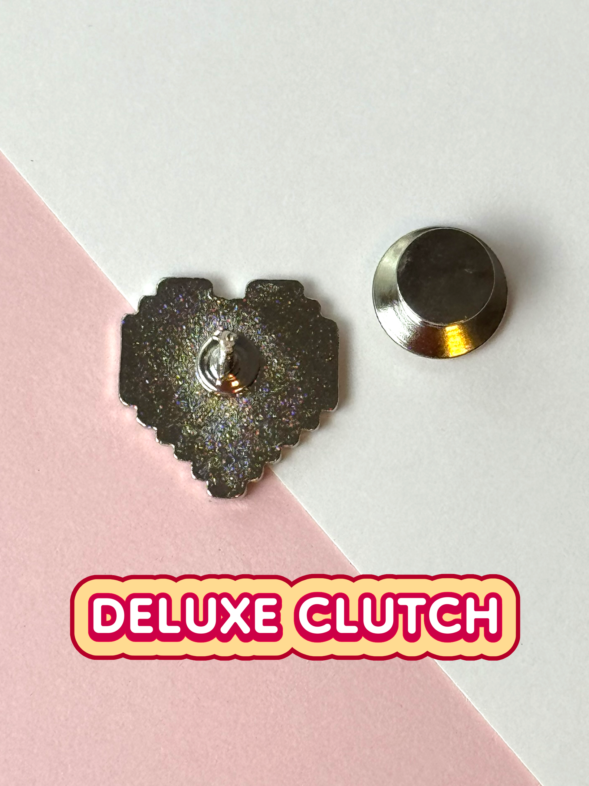The pixel heart pin has one deluxe clutch