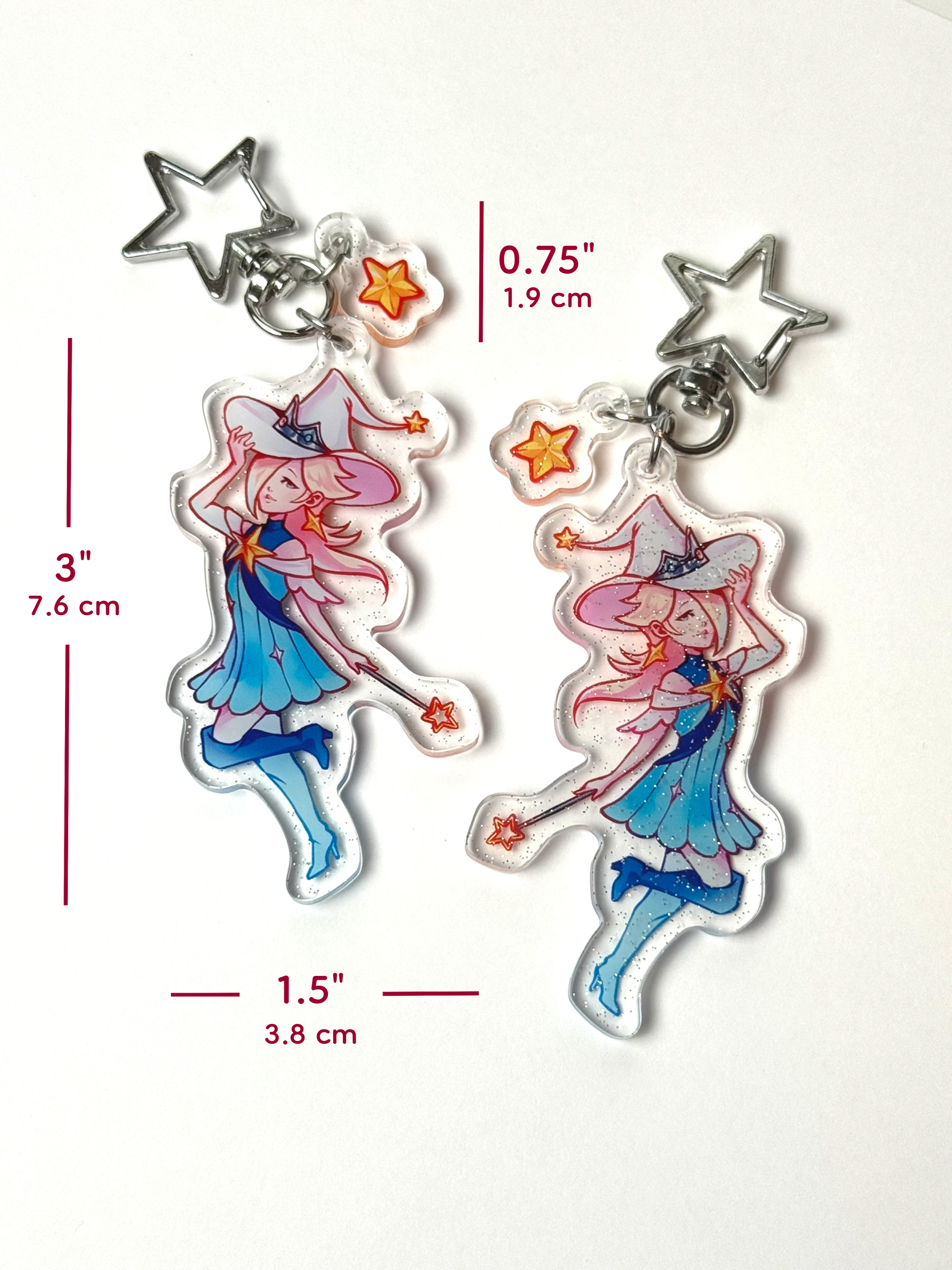The Princess Rosalina keychain measures 3 inches tall and 1.5 inches wide. The star clasp measures 0.75 inches tall.
