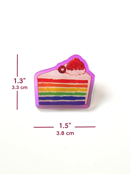 The rainbow cake pin measures 1.3 inches tall and 1.5 inches wide.