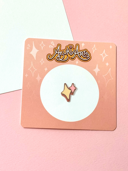 The sparkles pin shown with the backing card
