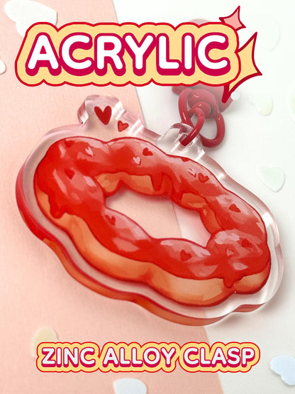 The strawberry mochi donut keychain is acrylic with a zinc alloy clasp.