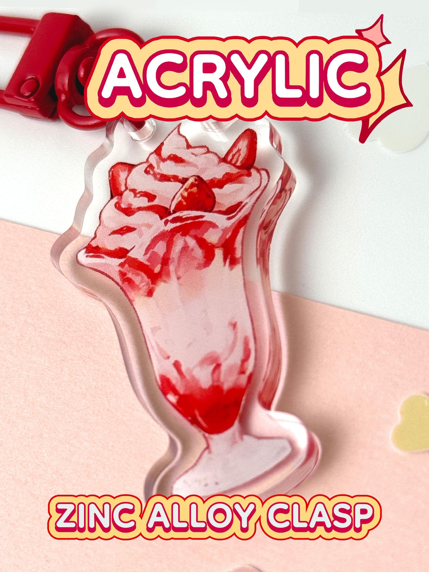 The strawberry parfait keychain is acrylic with a zinc alloy clasp.
