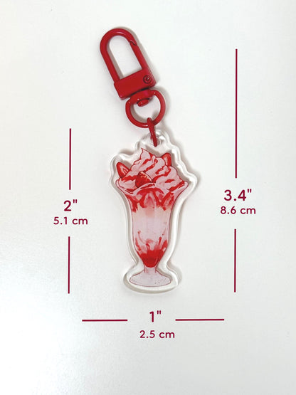 The strawberry parfait keychain measures 2 inches tall and 1 inches wide. With the clasp, it measures 3.4 inches tall.