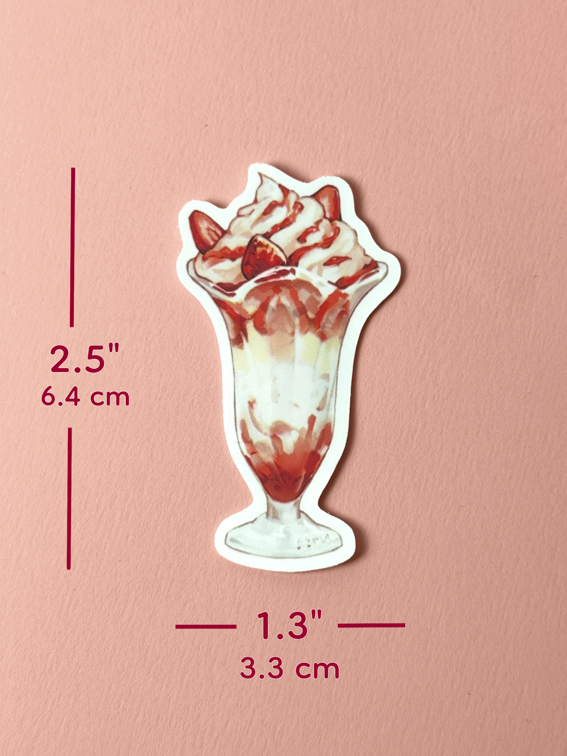 The parfait sticker measures 2.5 inches tall and 1.3 inches wide.
