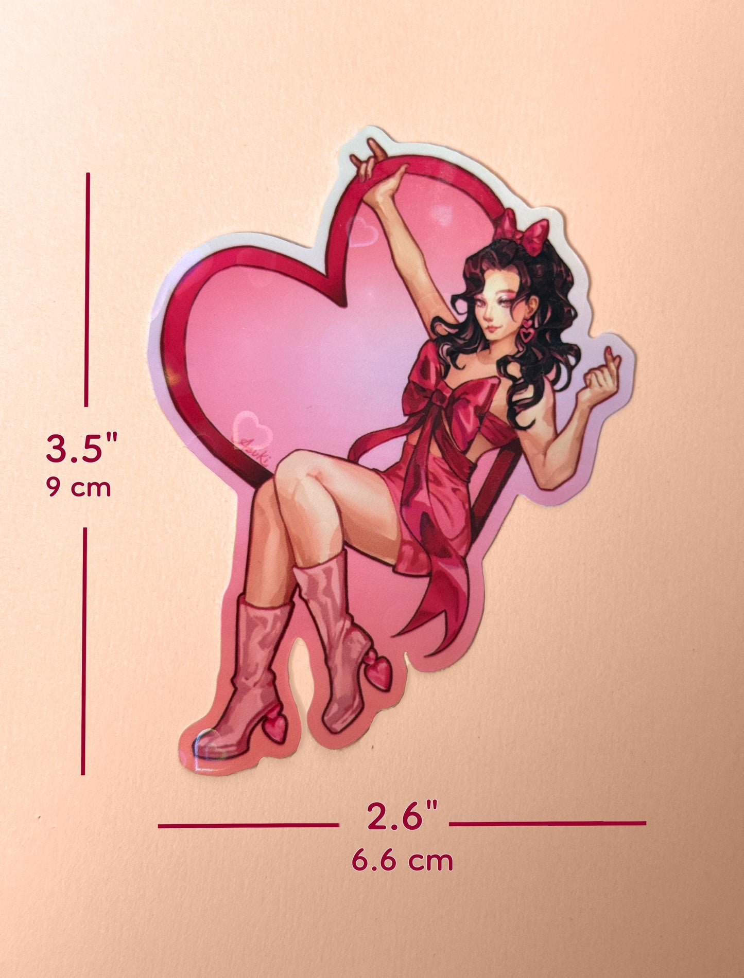 The Valentines Day girl sticker measures 3.5 inches tall and 2.6 inches wide.