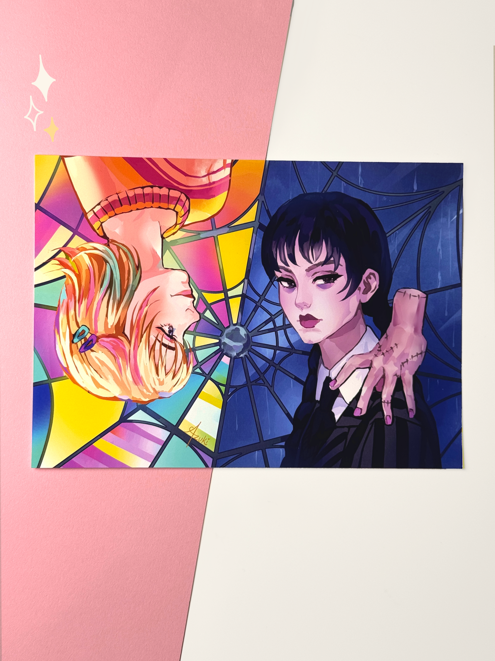 The Wednesday and Enid print shown on paper.