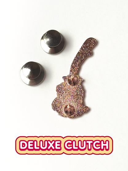 The witch broom pin shown with two deluxe clutches