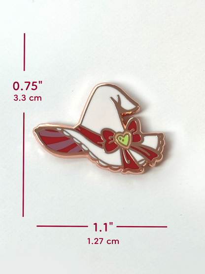 The witch hat pin measures 0.75 inches tall and 1.1 inches wide